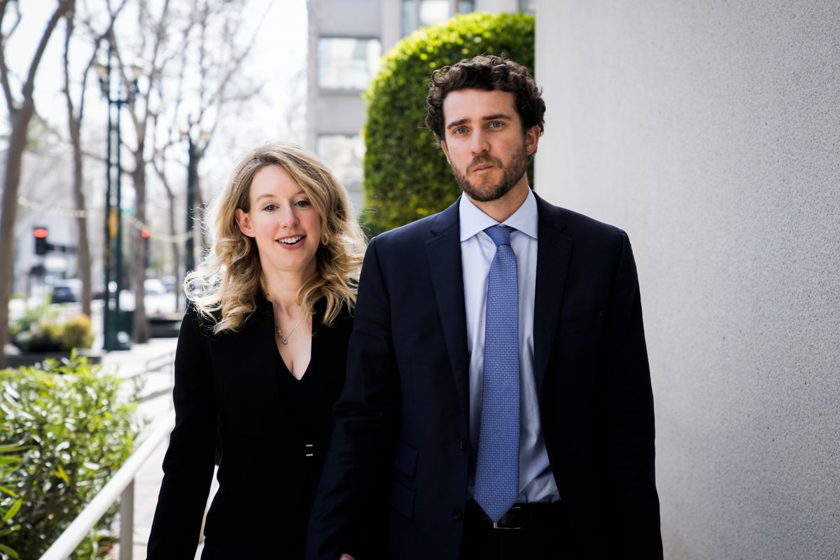 Elizabeth Holmes alongside her boyfriend Billy Evans