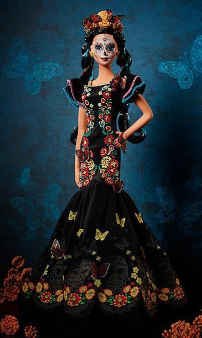 Toy manufacturer Mattel's Día de los Muertos Barbie comes in a floor length embroidered dress splashed with vibrant colors signature to the holiday