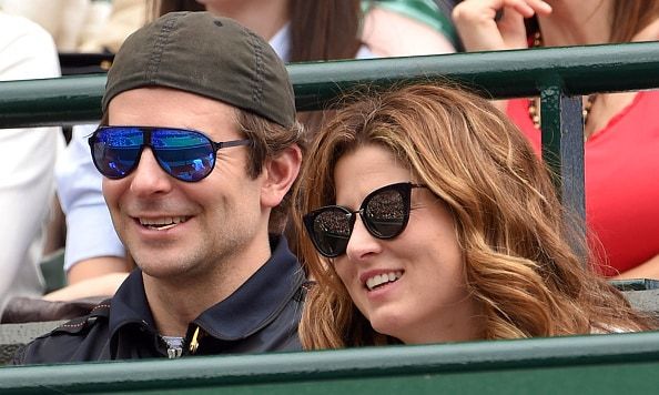 Keeping a low profile was Bradley Cooper, seated next to Mirka Federer.
Photo: Getty Images