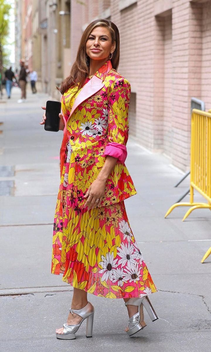 Eva Mendes in a colorful dress and silver platforms after visiting The View