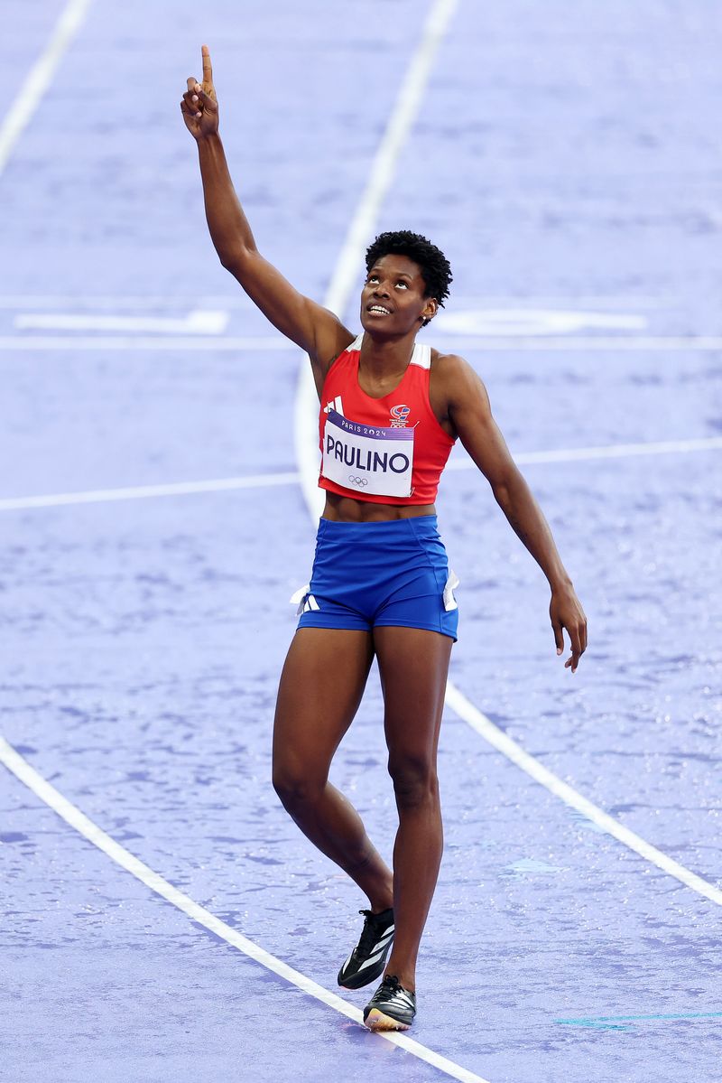 Marileidy Paulino of Team Dominican Republic celebrates winning the Gold medal in the Women's 400m Final on day fourteen of the Olympic Games Paris 2024 at Stade de France on August 09, 2024 in Paris, France. (Photo by Hannah Peters/Getty Images)