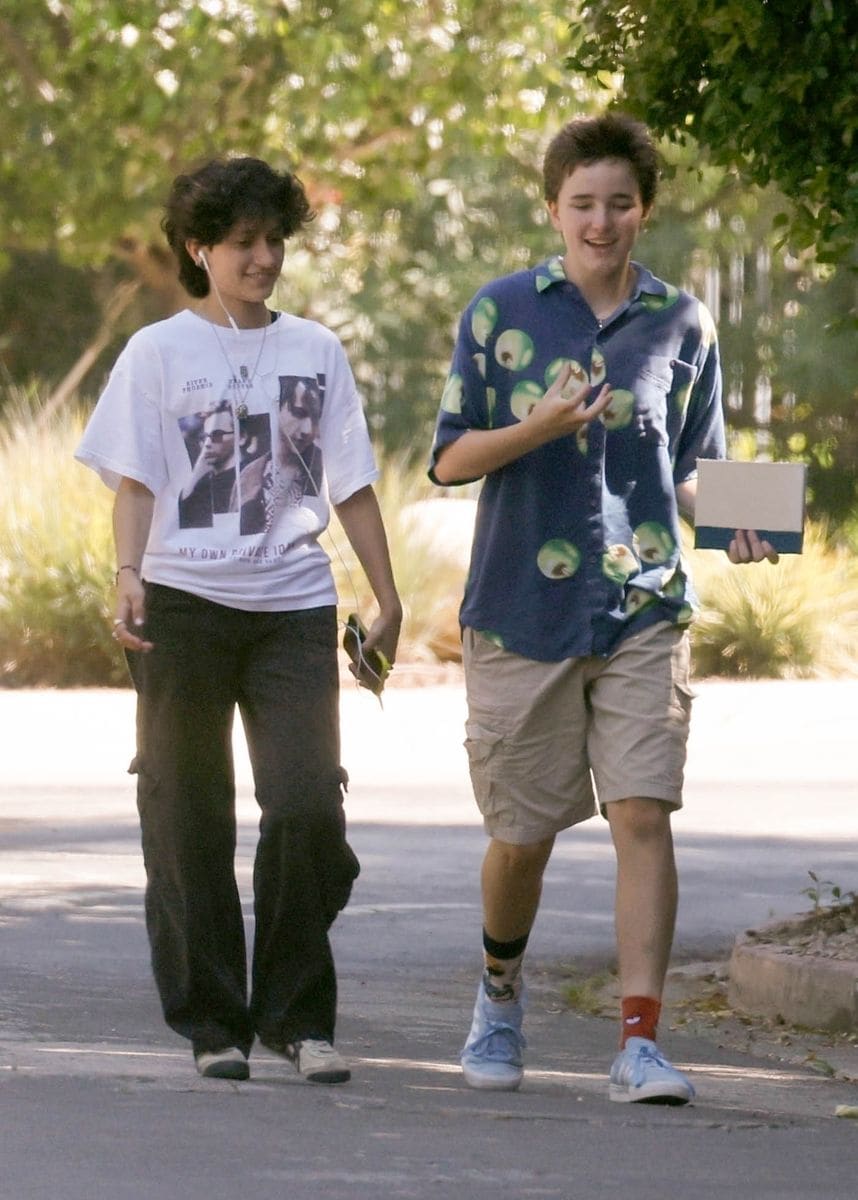 Fin, Emme, and a friend dance on the street in Brentwood. The two stayed friends despite parents divorce