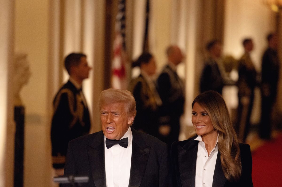 U.S. President Donald Trump and First Lady Melania Trump arrive for the National Governors Association Evening Dinner and Reception in the East Room of the White House 