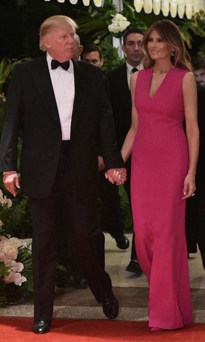The first lady donned a full-length, vibrant gown by Christian Dior, which she accessorized with emerald and diamond jewels for the 60th annual Red Cross Gala at the Trump's Mar-a-Lago estate in Palm Beach.
Photo: MANDEL NGAN/AFP/Getty Images