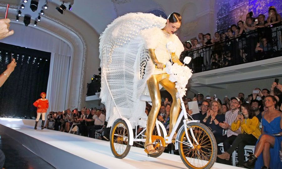 Meanwhile that same day Coco also took the runway for dear friend Jean Paul Gautier's show. "BRIDE ON A BIKE! I've closed #JeanPaulGaultier's runway in a wheel barrow, on crutches, in a mermaid tail, on a swing and now... on a tricycle!! Lots of love to my friend and mentor @jpgaultierofficial on a tremendous show! So many pieces I can't wait to wear this year!" she wrote on Instagram along with a photo of herself posing at the show."
Photo: Getty Images