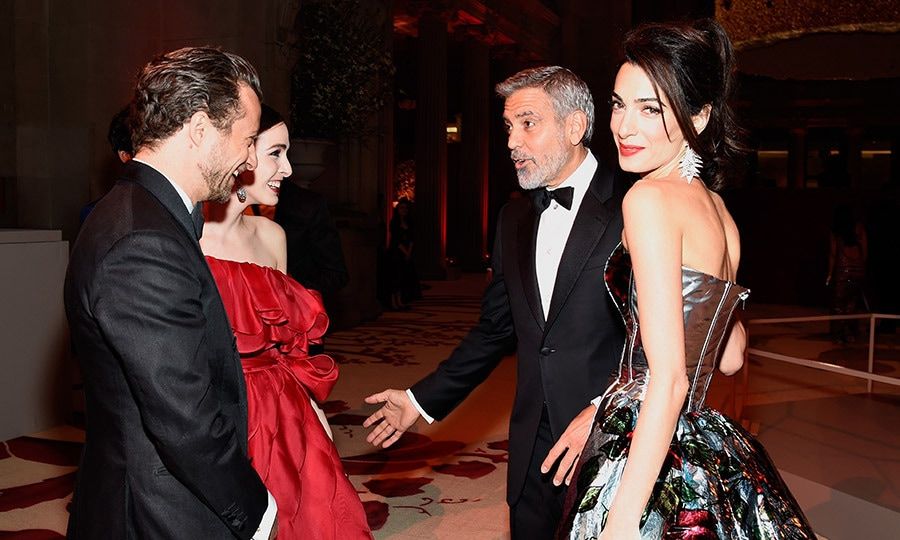 Amal Clooney flashed an over-the-shoulder smile as husband George Clooney chatted with Francesco Carrozzini and Bee Shaffer inside the Met Gala celebration.
Photo: Kevin Mazur/MG18/Getty Images for The Met Museum/Vogue