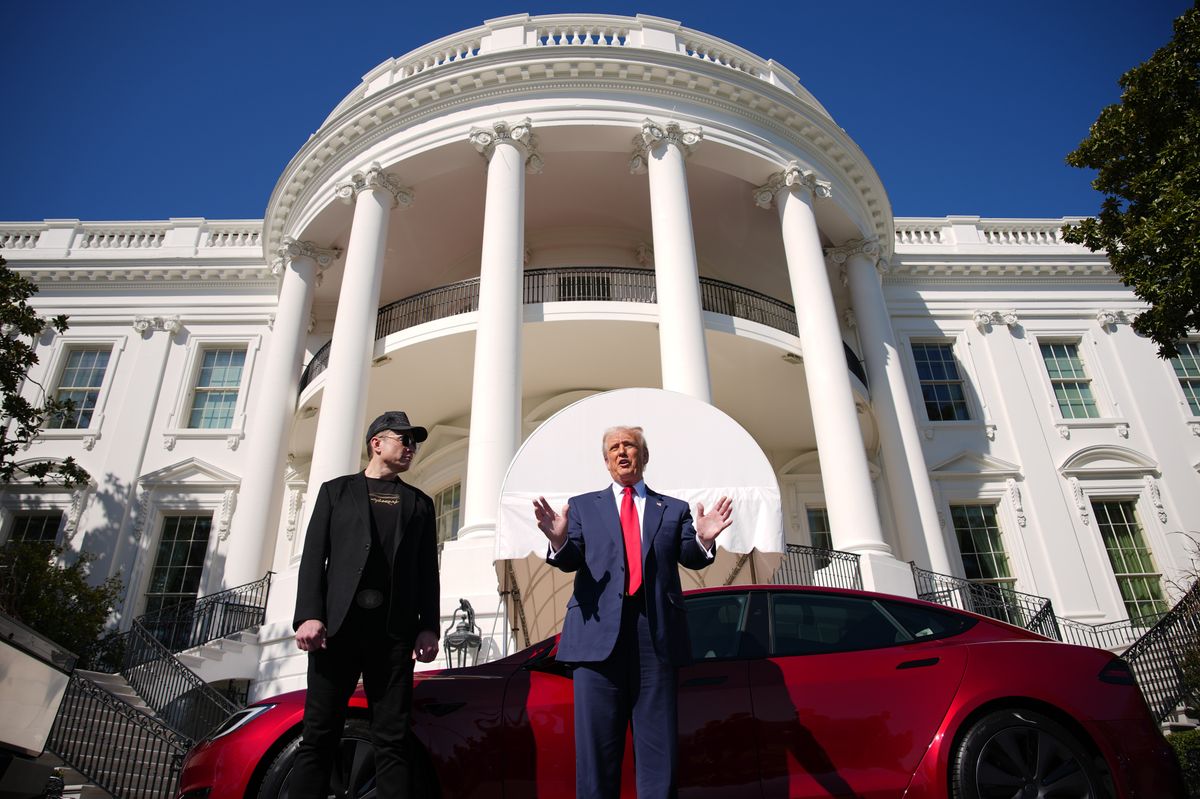 WASHINGTON, DC - MARCH 11: U.S. President Donald Trump and White House Senior Advisor, Tesla and SpaceX CEO Elon Musk deliver remarks next to a Tesla Model S on the South Lawn of the White House on March 11, 2025 in Washington, DC. Trump spoke out against calls for a boycott of Elon Muskâs companies and said he would purchase a Tesla vehicle in what he calls a âshow of confidence and supportâ for Elon Musk. (Photo by Andrew Harnik/Getty Images)