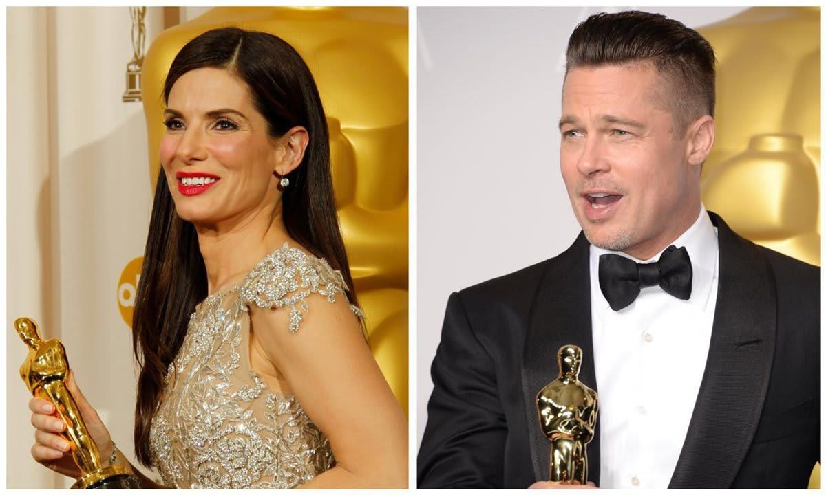 Brad Pitt and Sandra Bullock pose with their Oscar’s