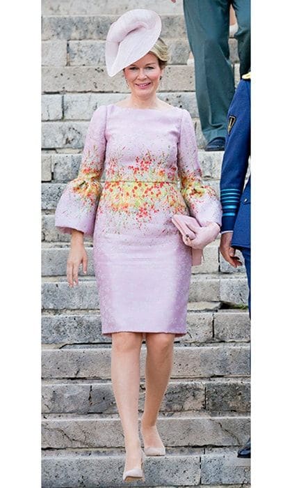 Queen Mathilde looked lovely in a watercolor bloom print Natan dress with bell sleeves as she joined the royal family for Belgium's National Day.
Photo: Getty Images