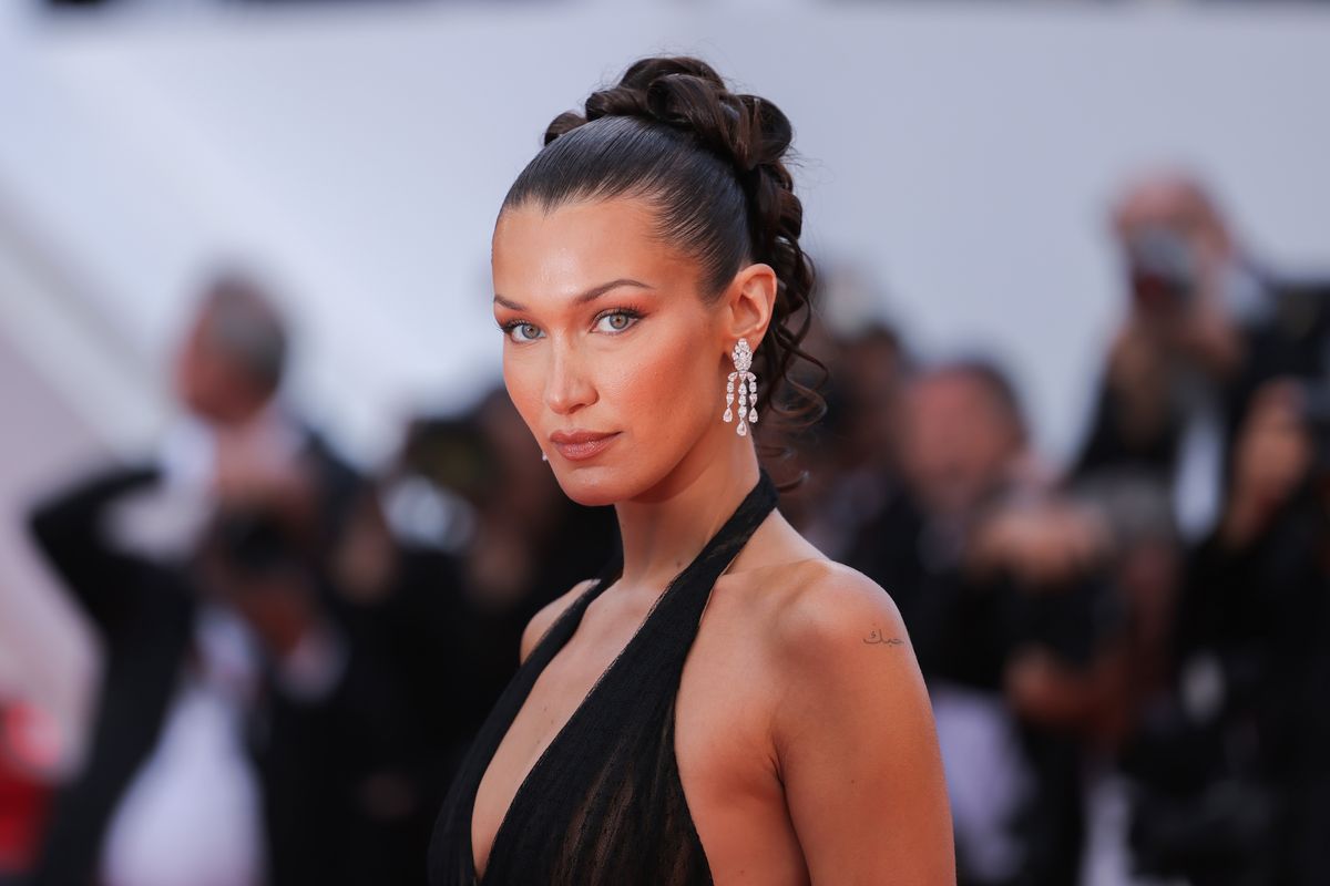 Bella Hadid attends the "L'Amour Ouf" (Beating Hearts) Red Carpet at the 77th annual Cannes Film Festival at Palais des Festivals on May 23, 2024 in Cannes, France. 