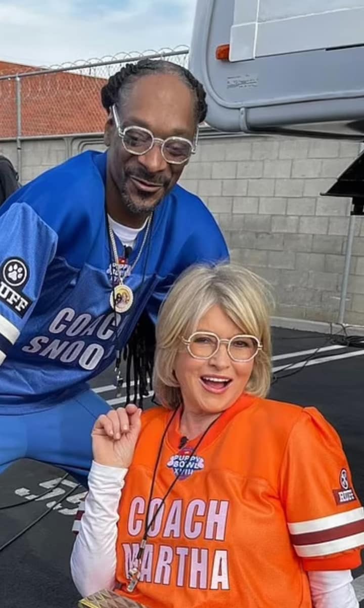 Martha Stewart and Snoop Dogg rock matching diamond and gold glasses while taping Puppy Bowl XVIII