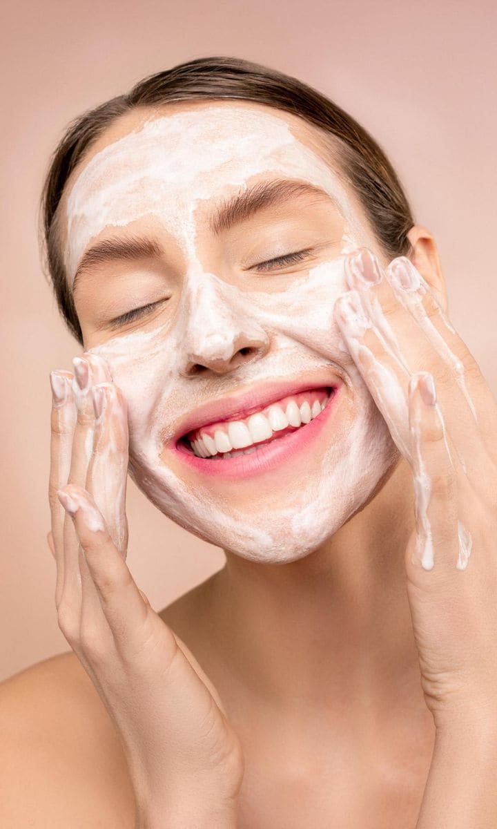 Woman facial soap on face