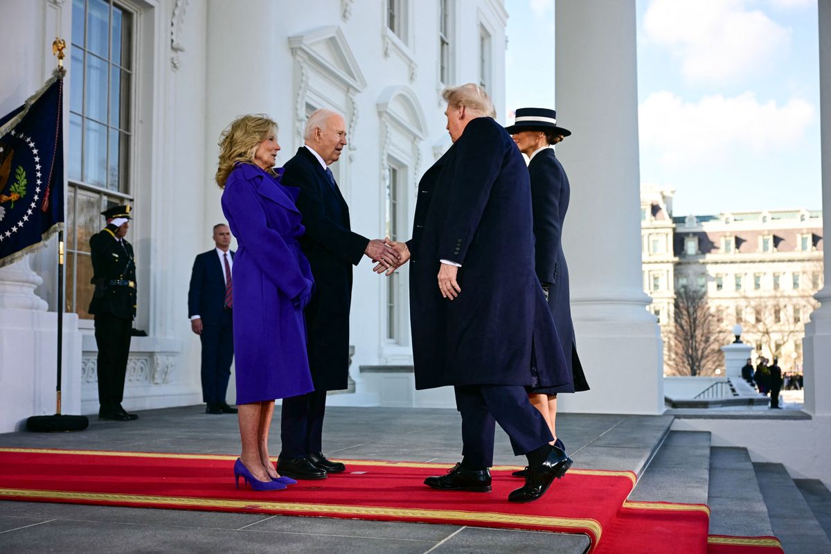 Joe Biden and First Lady Jill Biden greet President-elect Donald Trump and Melania Trump as they arrive at the White House 