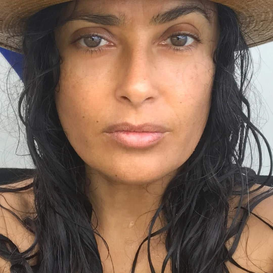 Salma Hayek wearing a hat and without makeup