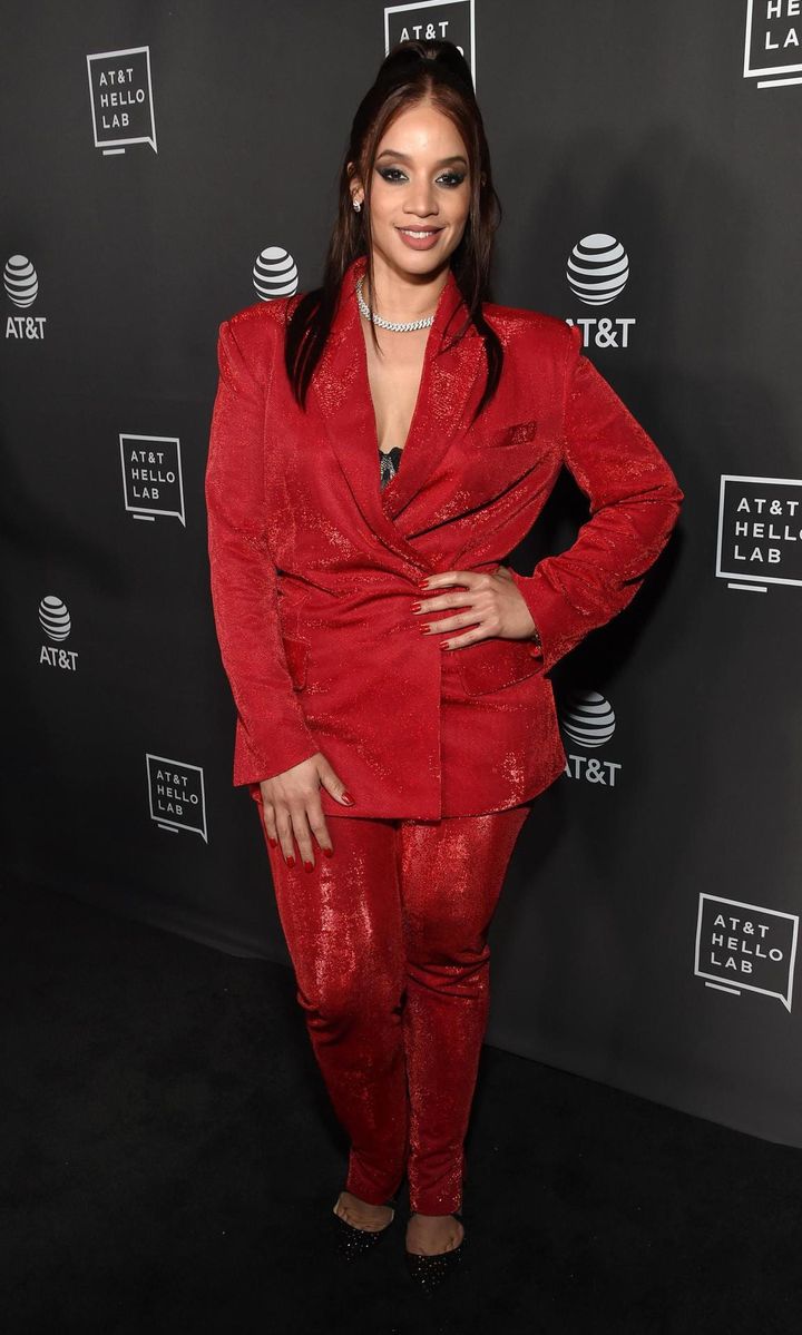 Dascha Polanco in a red tailored suit by Venera Arapu