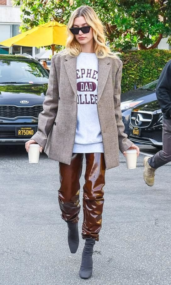 Hailey Baldwin in a blazer and faux leather pants