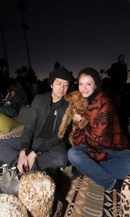 October 15: Date night! Christina Hendricks and Geoffrey Arend snuggled up with their dog, Zou Zou during the Cinespia screening of <i>Death Becomes Her</i> at the Hollywood Forever Cemetery in L.A.
Photo: Kelly Lee Barrett for Cinespia