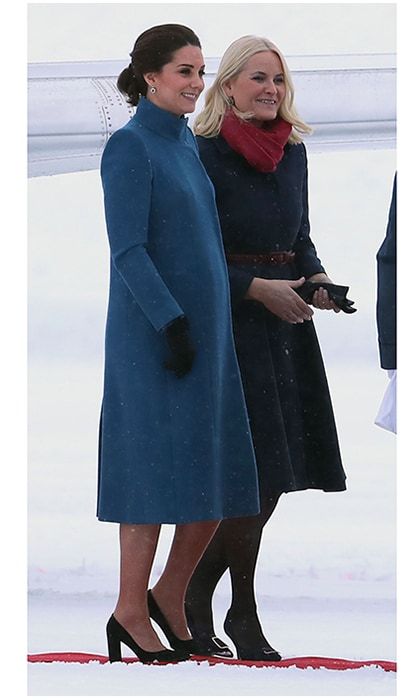 Earlier in the day, after their arrival was delayed by the snow, Prince William and Duchess Kate had arrived in Oslo, where they were greeted by <a href="https://us.hellomagazine.com/tags/1/crown-princess-mette-marit/"><strong>Crown Princess Mette-Marit</strong></a> (pictured) and Crown Prince Haakon. For the first appearance of the day at the airport, Kate chose a warm high-necked coat by favorite <a href="https://us.hellomagazine.com/tags/1/catherine-walker/"><strong>Catherine Walker</strong></a>.
Photo: WENN