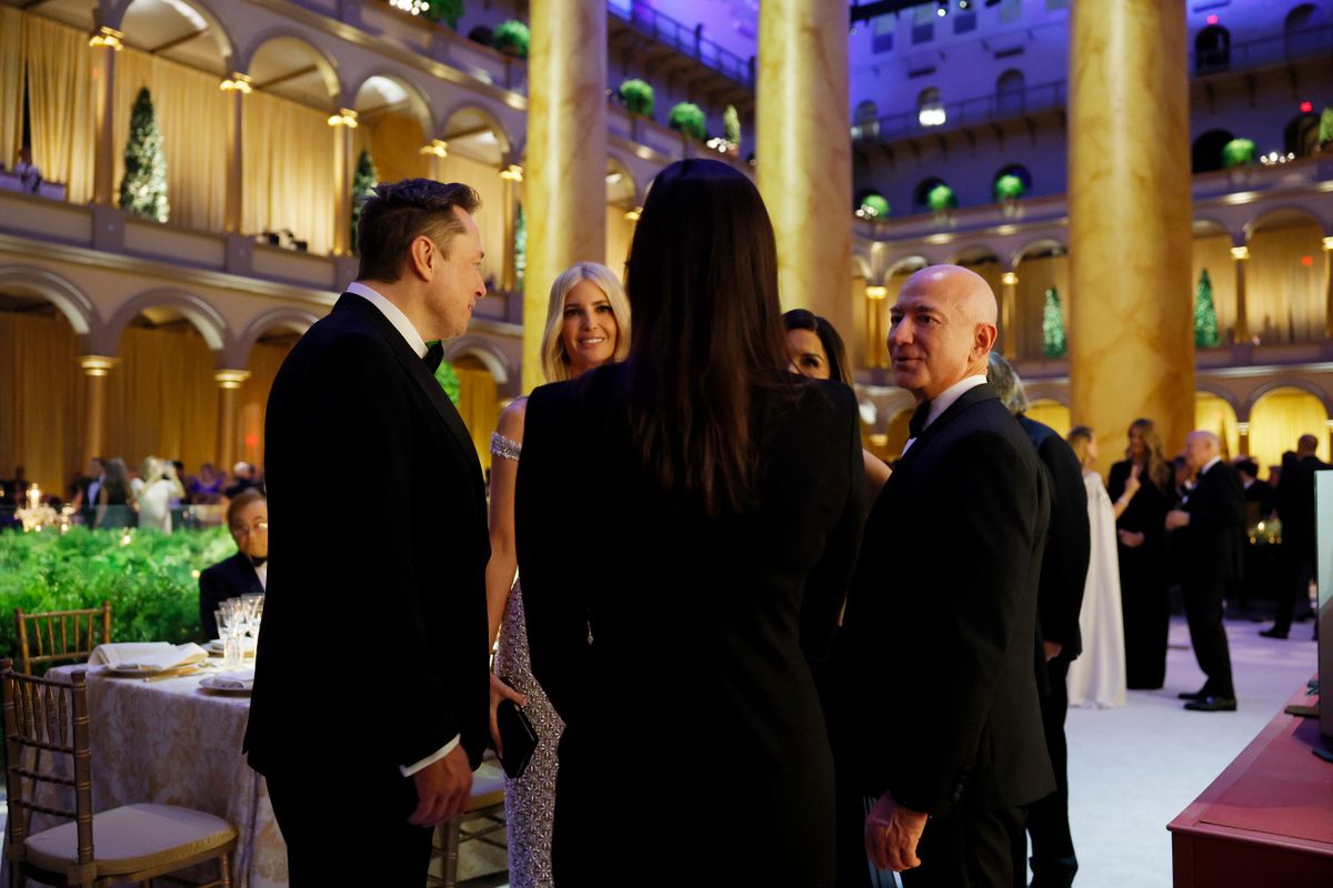 WASHINGTON, DC - JANUARY 19: (L-R) Elon Musk, Ivanka Trump, and Jeff Bezos speak to one another at a candlelight dinner for U.S. President-elect Donald Trump at the National Building Museum on January 19, 2025 in Washington, DC.Â Trump will be sworn in as the 47th U.S. president on January 20. (Photo by Anna Moneymaker/Getty Images)