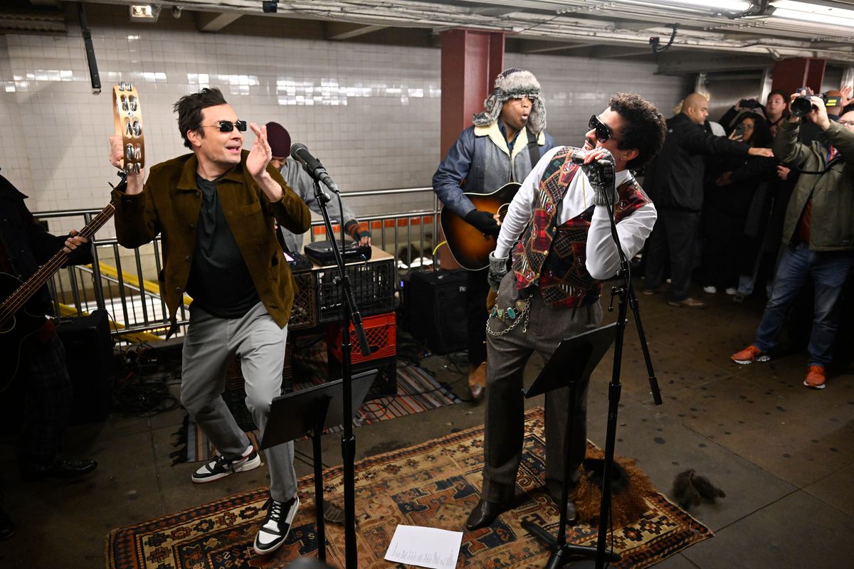 THE TONIGHT SHOW STARRING JIMMY FALLON -- Episode 2077 -- Pictured: (l-r) Host Jimmy Fallon with rapper & singer Bad Bunny during "Subway Busking" with The Roots on Monday, January 13, 2025 -- (Photo by: Todd Owyoung/NBC via Getty Images)