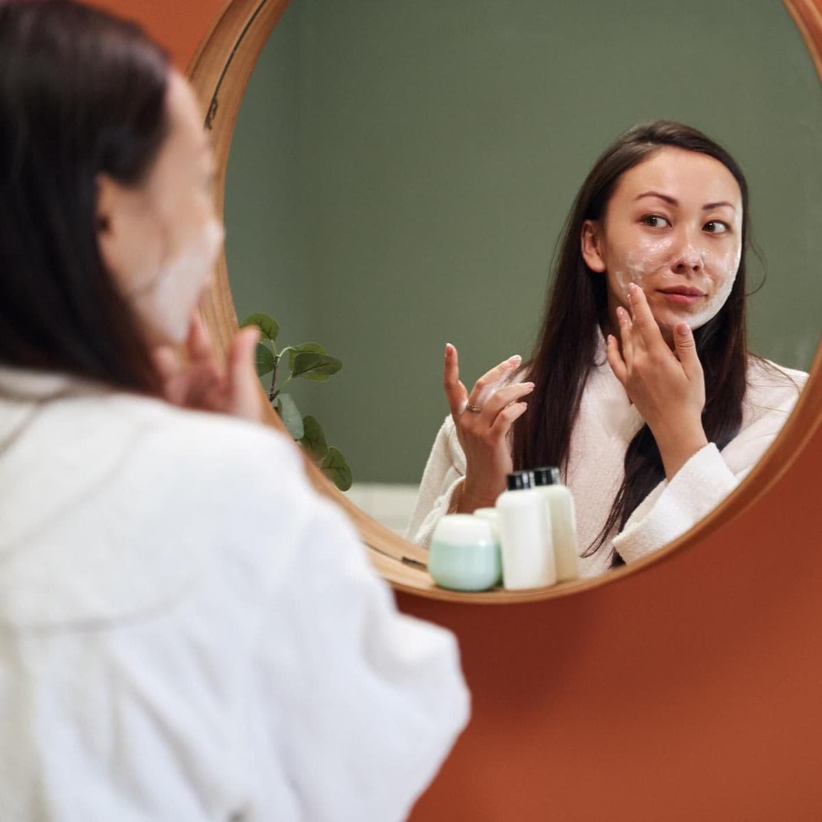 woman washing face