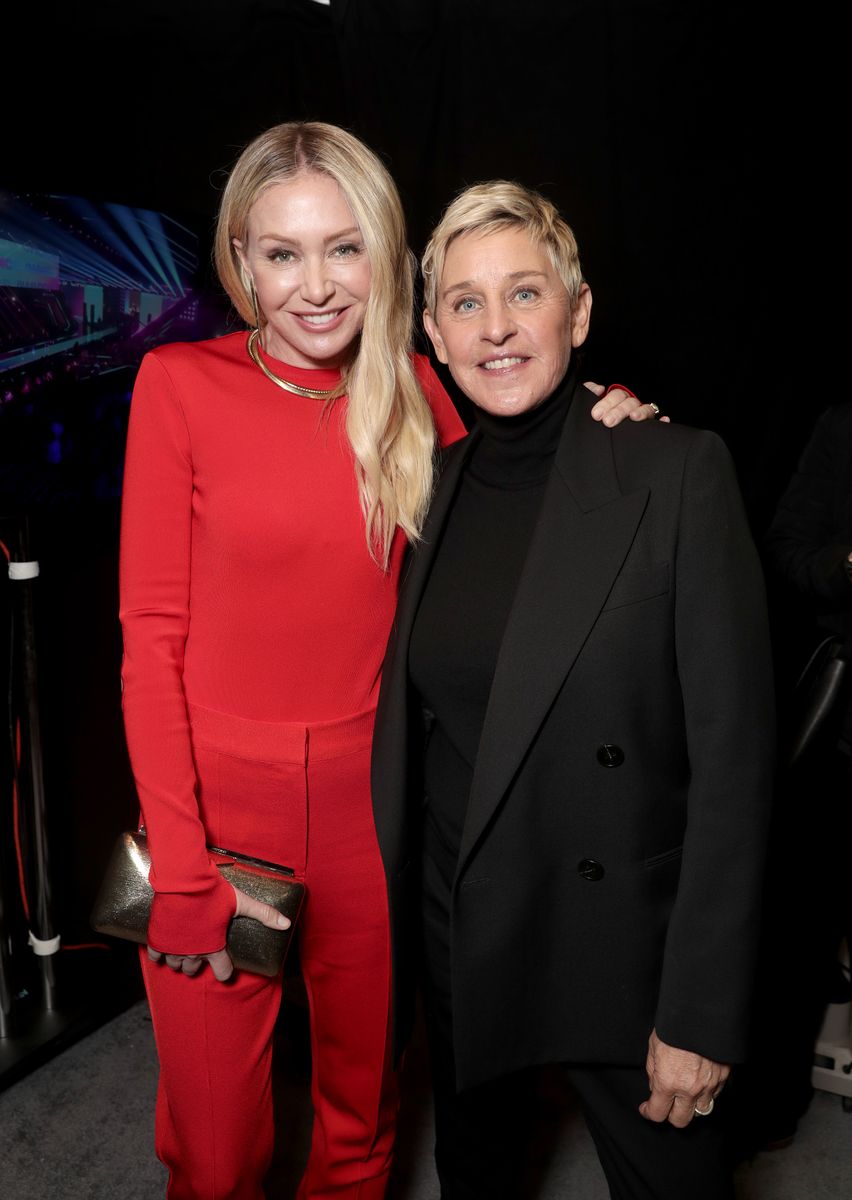 SANTA MONICA, CALIFORNIA - DECEMBER 07: 2021 PEOPLE'S CHOICE AWARDS -- Pictured: (l-r) Portia de Rossi and Ellen DeGeneres pose backstage during the 2021 People's Choice Awards held at Barker Hangar on December 7, 2021 in Santa Monica, California. (Photo by Todd Williamson/E! Entertainment/NBCUniversal/NBCU Photo Bank via Getty Images)