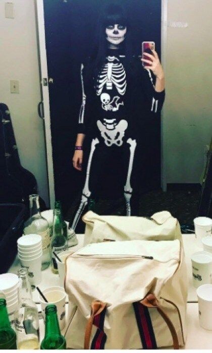 Behati Prinsloo totally nailed her Halloween costume. The model went as a spooky skeleton with an awesome twist. Since she's pregnant, she put a baby skeleton over her growing baby bump! Behati shared tons of Instagram Story photos and videos during her night out with hubby Adam Levine.
Photo: Instagram/@behatiprinsloo