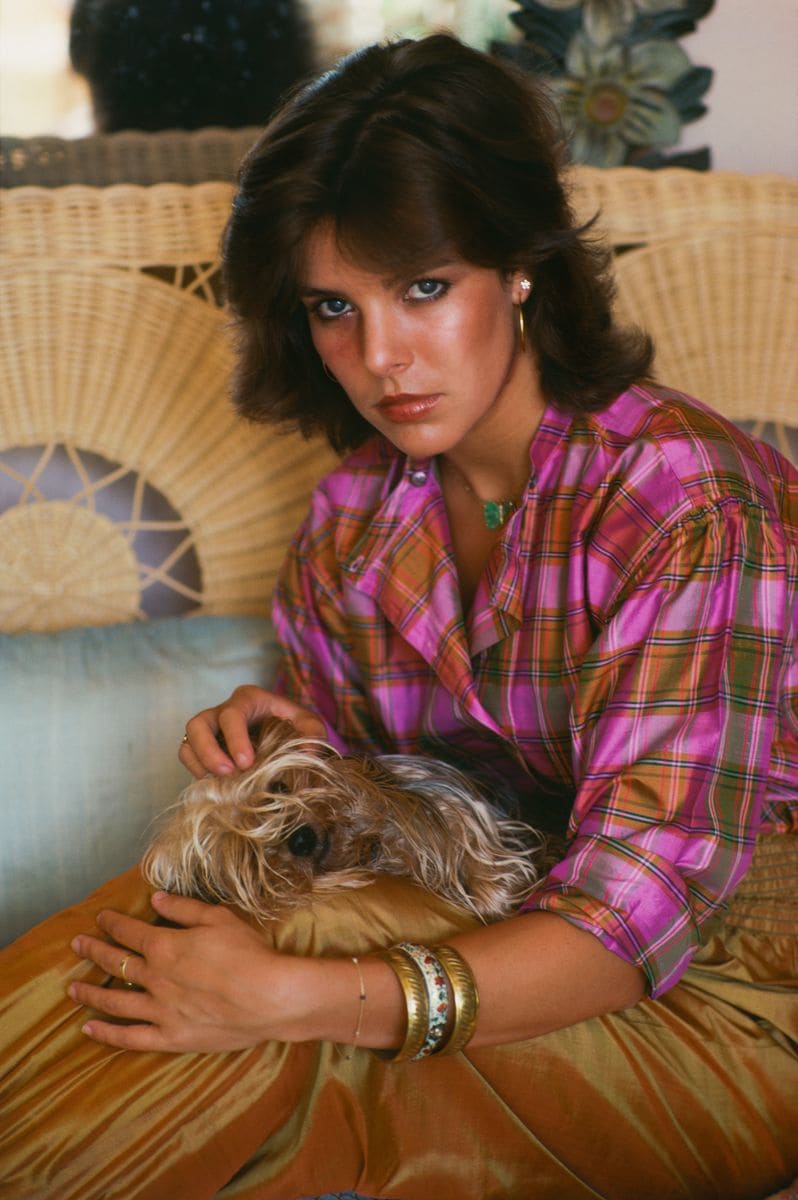 Princess Caroline of Monaco (daughter of American film star Grace Kelly and Prince Rainier III of Monaco) with her dog Tiffany, Monte Carlo, Monaco, August 1981. (Photo by Slim Aarons/Getty Images)