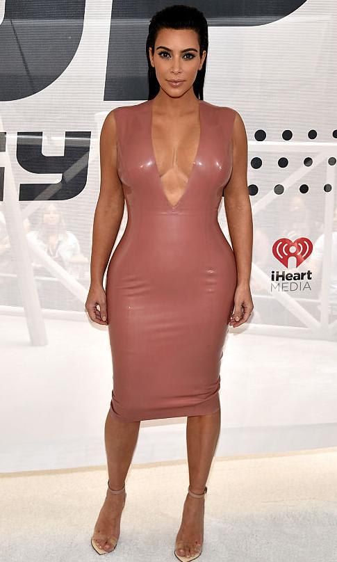 Kim Kardashian in a pink latex dress
