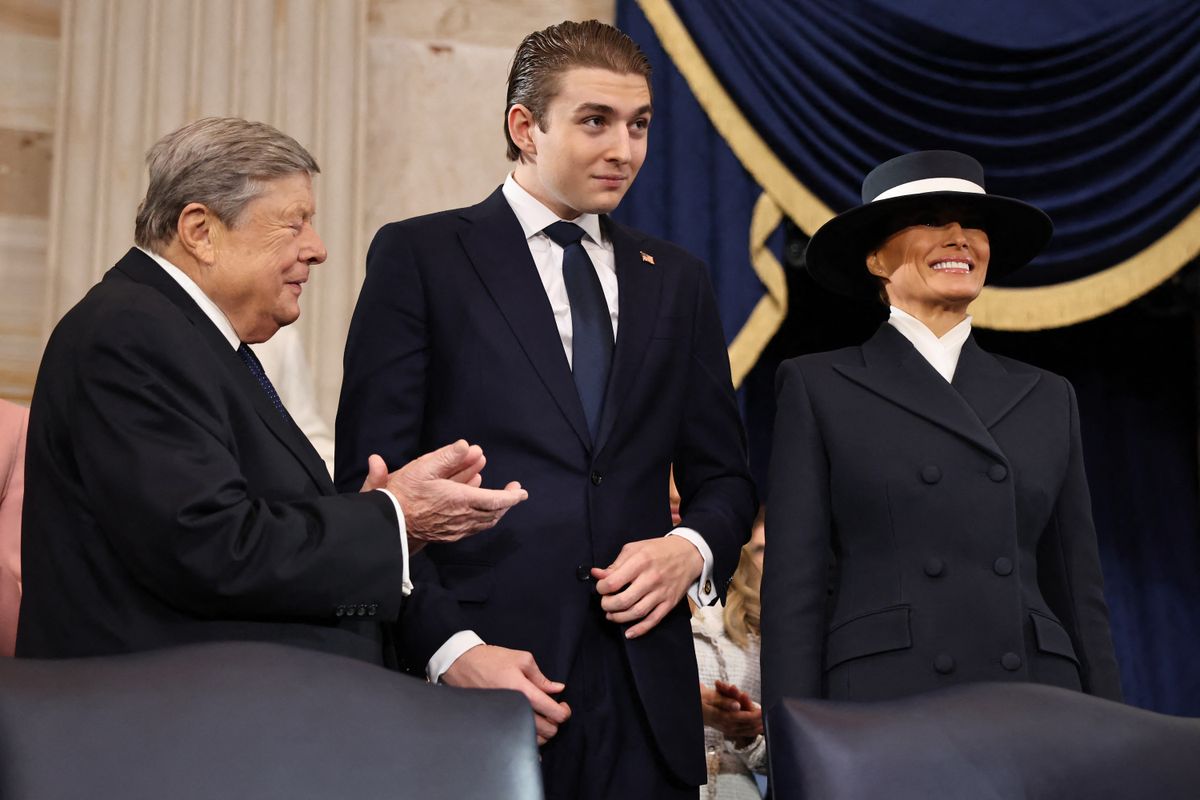 Viktor Knavs, Barron Trump and Melania Trump attend the inauguration of US President-elect Donald Trump in the Rotunda of the US Capitol on January 20, 2025 in Washington, DC. Donald Trump takes office for his second term as the 47th president of the United States. (Photo by Chip Somodevilla / POOL / AFP) (Photo by CHIP SOMODEVILLA/POOL/AFP via Getty Images)