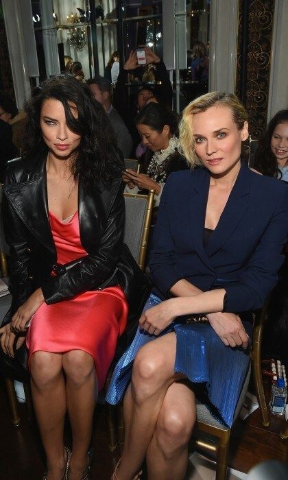 Silk and jackets! Adriana Lima and Diane Kruger were a gorgeous duo as they sat next to each other during the Jason Wu Runway show at the St. Regis. Looking effortlessly gorgeous in red and blue, the stars enjoyed sipping FIJI Water and taking photos of their favorite looks.
Photo: Ben Gabbe/Getty Images