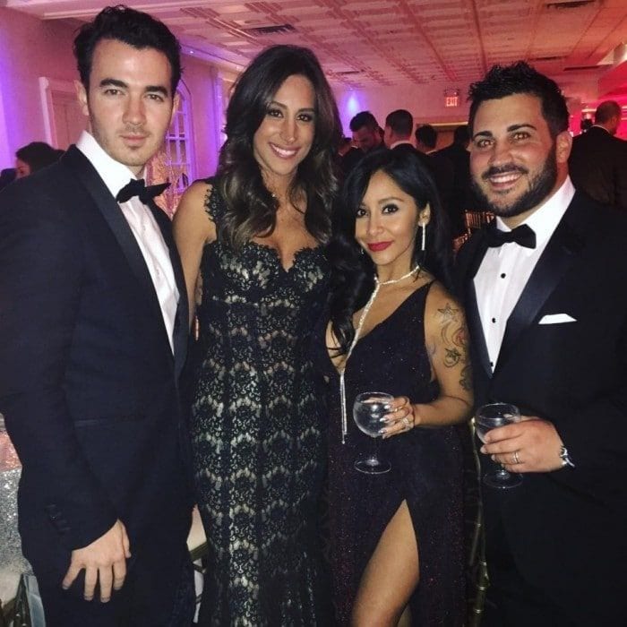 Jersey pride! Snooki shared a shot of her and husband, Jionni LaValle, with Kevin and Danielle Jonas. The stars celebrated NYE at celebrity trainer Anthony Michael's wedding.
"What a banging group. #2017 @jlavalle5 @daniellejonas @kevinjonas" the reality star wrote.
Photo: Instagram/@snooki