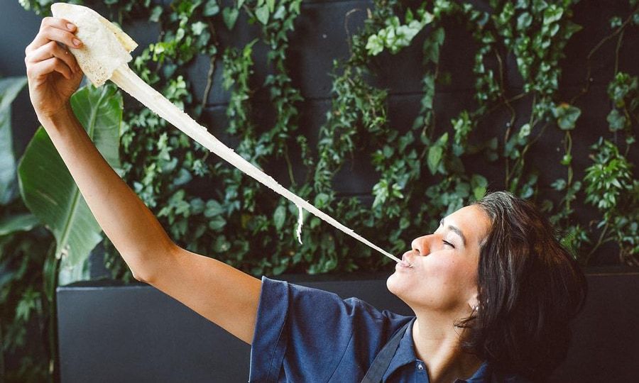 Daniela Soto Innes eating a quesadilla