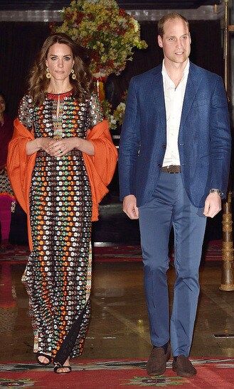 <b>Tory Burch: USA</b>
<br>
The floral mesh gown featuring retro-inspired flowers and side slits saw the Duchess dial up the color while embracing local tradition for a private dinner with Bhutan's King and Queen at Lingkana Palace, Bhutan, this spring.
</br><br>
Tory told <b>HELLO!</b> that she was "a big fan" of Kate's and "thrilled" that the royal had chosen to wear her dress, adding, "She looked beautiful."
<br>
Photo: UK Press Pool/Getty Images