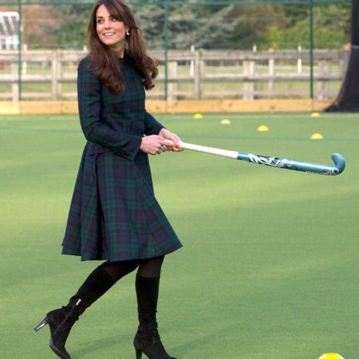 This time, the Duchess opts for a flowy plaid coat while visiting St. Andrew's School.
<br>
Photo: Getty Images