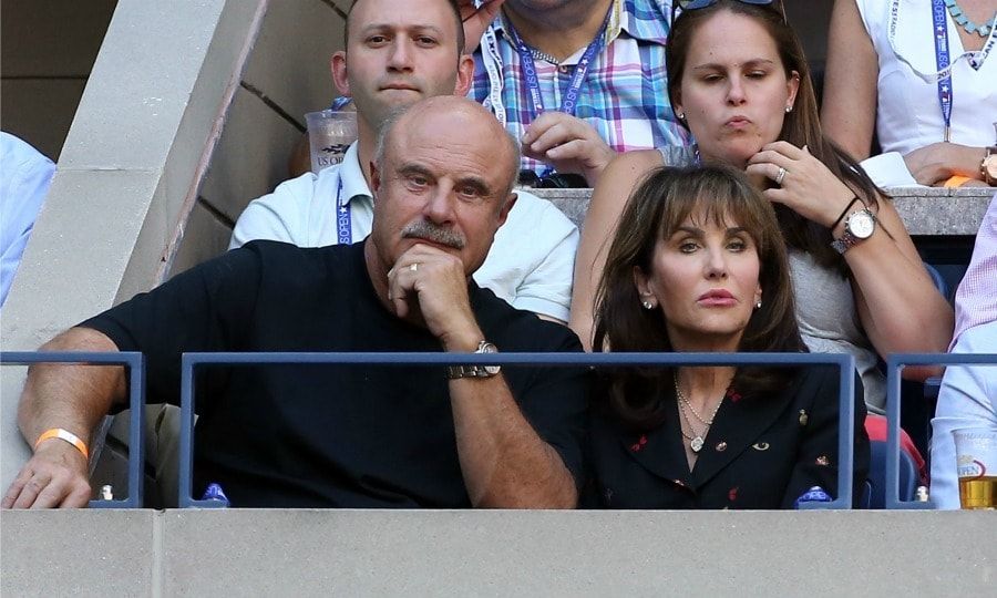 Is there a doctor in the house? Dr. Phil and his wife Robin McGraw showed off their game faces during the men's final match.
Photo: Jean Catuffe/GC Images