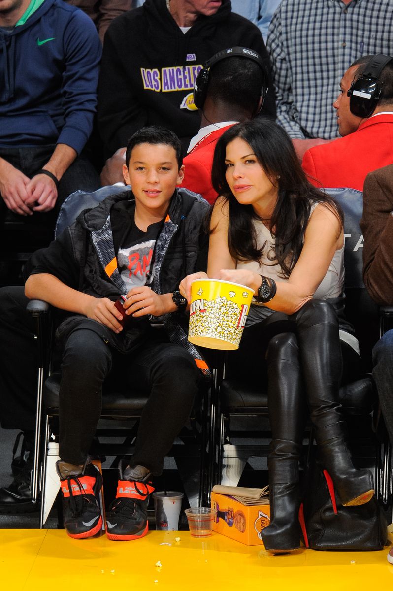 LOS ANGELES, CA - JANUARY 28:  Lauren Sanchez and her son Nikko Gonzalez attend a basketball game between the Indiana Pacers and the Los Angeles Lakers at Staples Center on January 28, 2014 in Los Angeles, California.  (Photo by Noel Vasquez/GC Images)