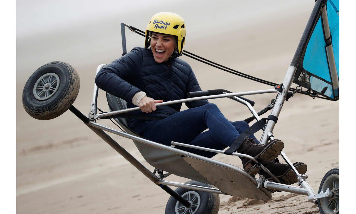 The Duchess laughed while land yachting with Prince William on a beach in St Andrews in May.