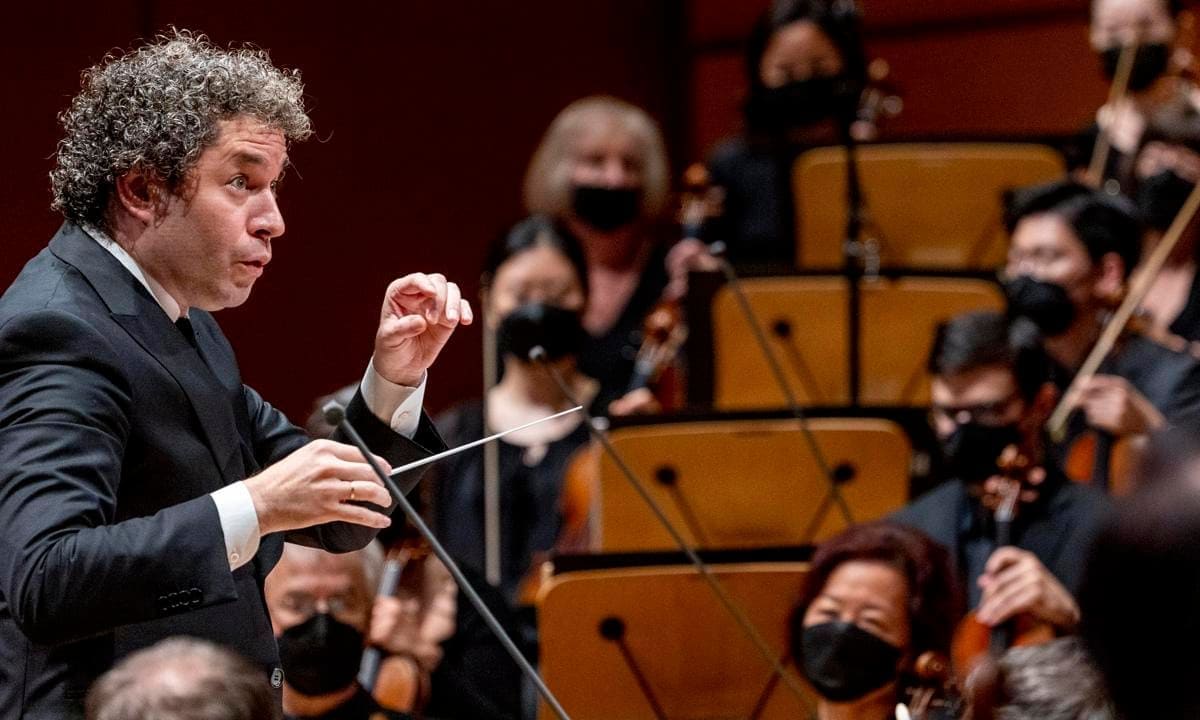 Los Angeles Philharmonic conductor Gustavo Dudamel conducts as María Dueñas, violinin, performs at the Walt Disney Concert Hall