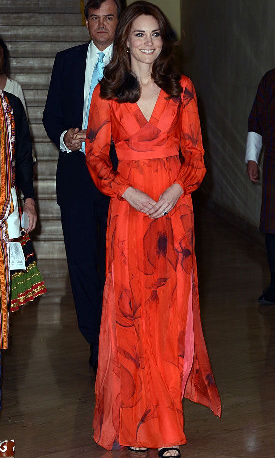 Kate Middleton cleaned up nicely after her Friday hike to attend a formal reception celebrating relations between Britain and Bhutan. The Duchess stepped out for the formal occasion wearing a pleated, chiffon gown by British label Beulah London. The $1,057 frock was a nod to the host country with its poppy print (Bhutan's national flower is the poppy).
<br>
Photo: Getty Images