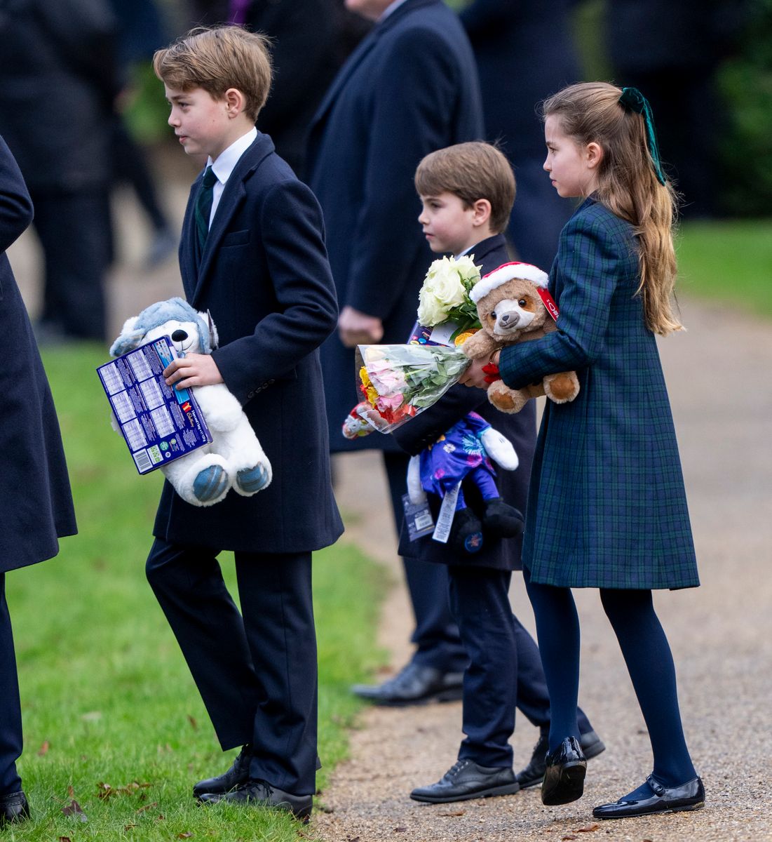 SANDRINGHAM, NORFOLK - DECEMBER 25: Prince George of Wales with Princess Charlotte of Wales and Prince Louis of Wales attend the Christmas Morning Service at St Mary Magdalene Church on December 25, 2024 in Sandringham, Norfolk. (Photo by Mark Cuthbert/UK Press via Getty Images)