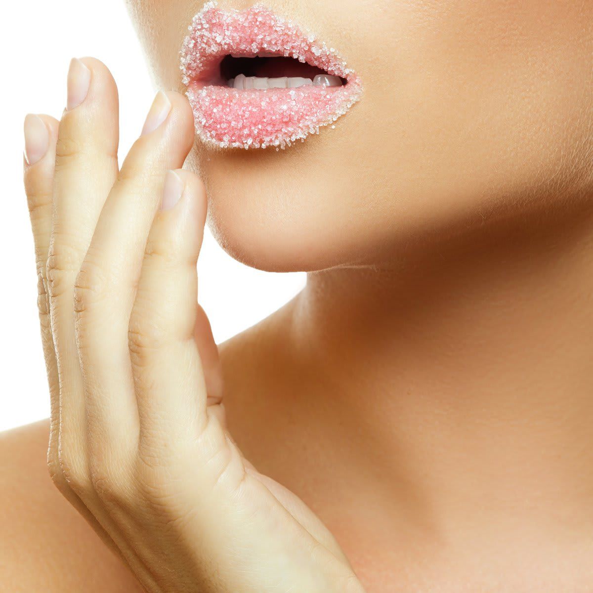 Woman with natural exfoliating scrub on her lips