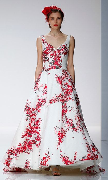 Red wedding gowns are increasingly in demand here's a beautiful floral take, in a traditional v-neck style with A-line skirt, in red and white from Cymbeline.
Photo: Getty Images