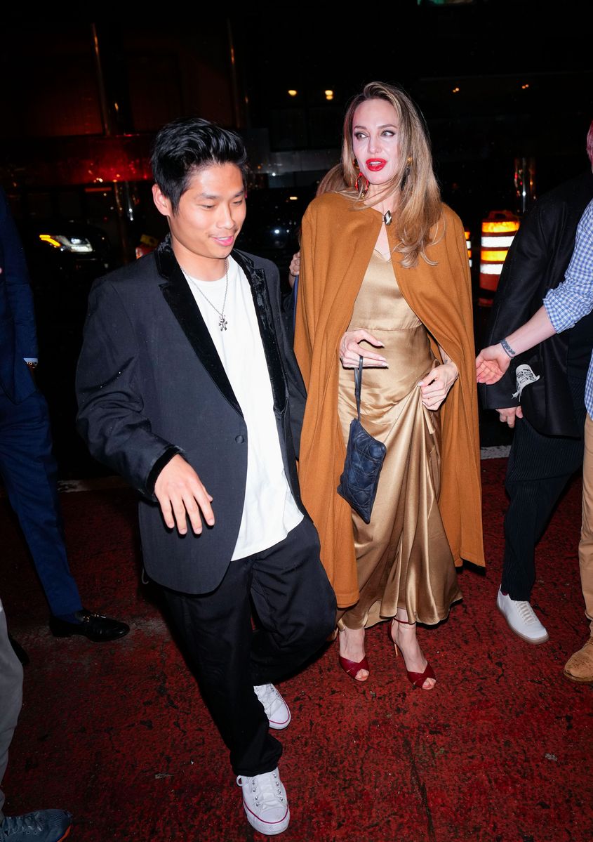 Angelina Jolie and Pax Jolie-Pitt arrive at the afterparty of "The Outsiders" on April 11, 2024, in New York City. 