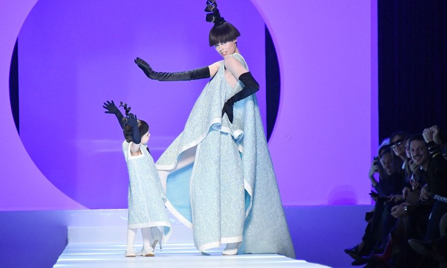 Coco's two-year-old daughter followed in her mom's footsteps on the Jean-Paul Gaultier runway. The supermodel, who is pregnant with her second child, gave her little girl a big hug and kiss at the end of the runway.
Photo: Getty Images