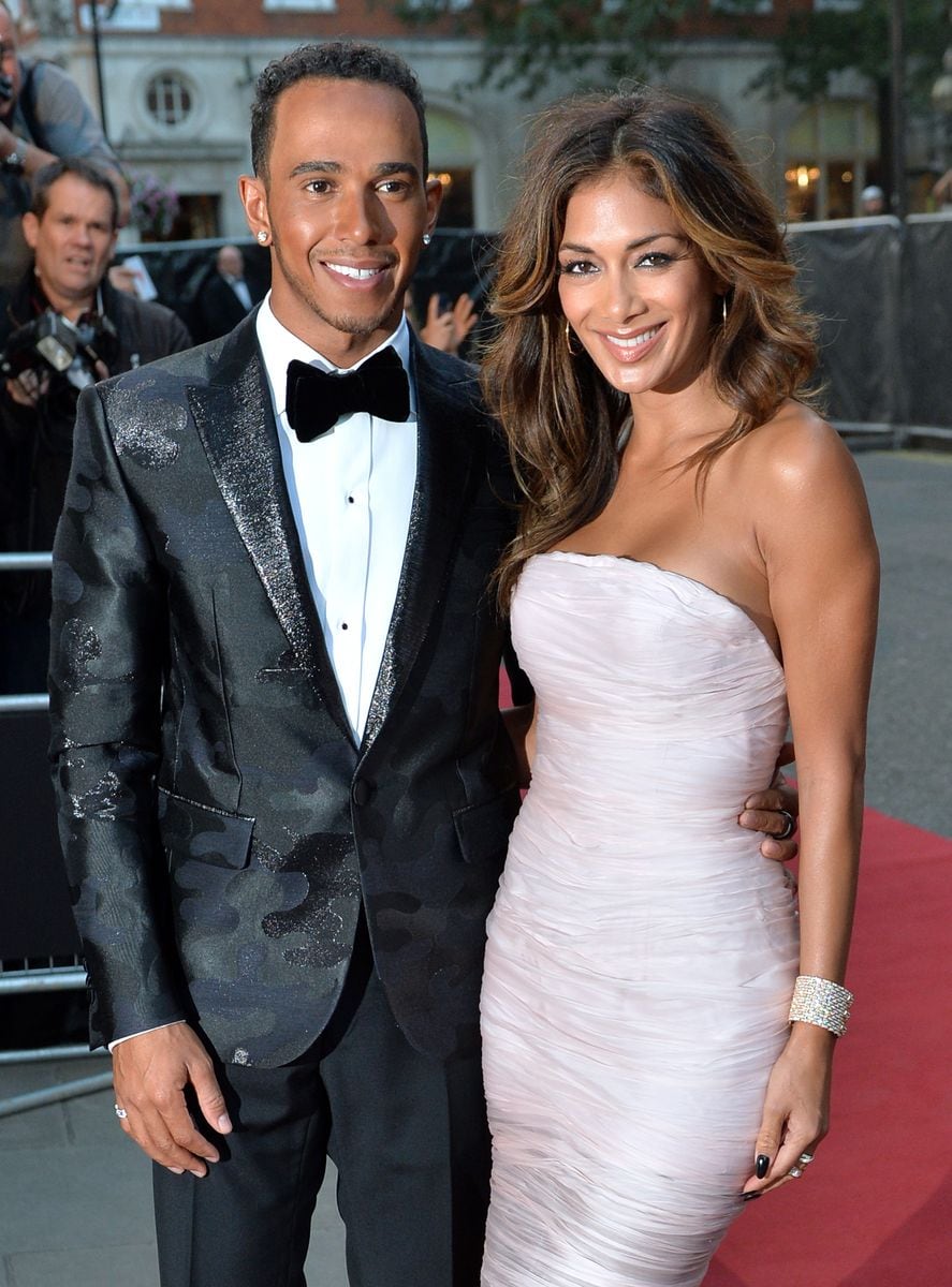  Lewis Hamilton and Nicole Scherzinger attend the GQ Men of the Year awards at The Royal Opera House on September 2, 2014 