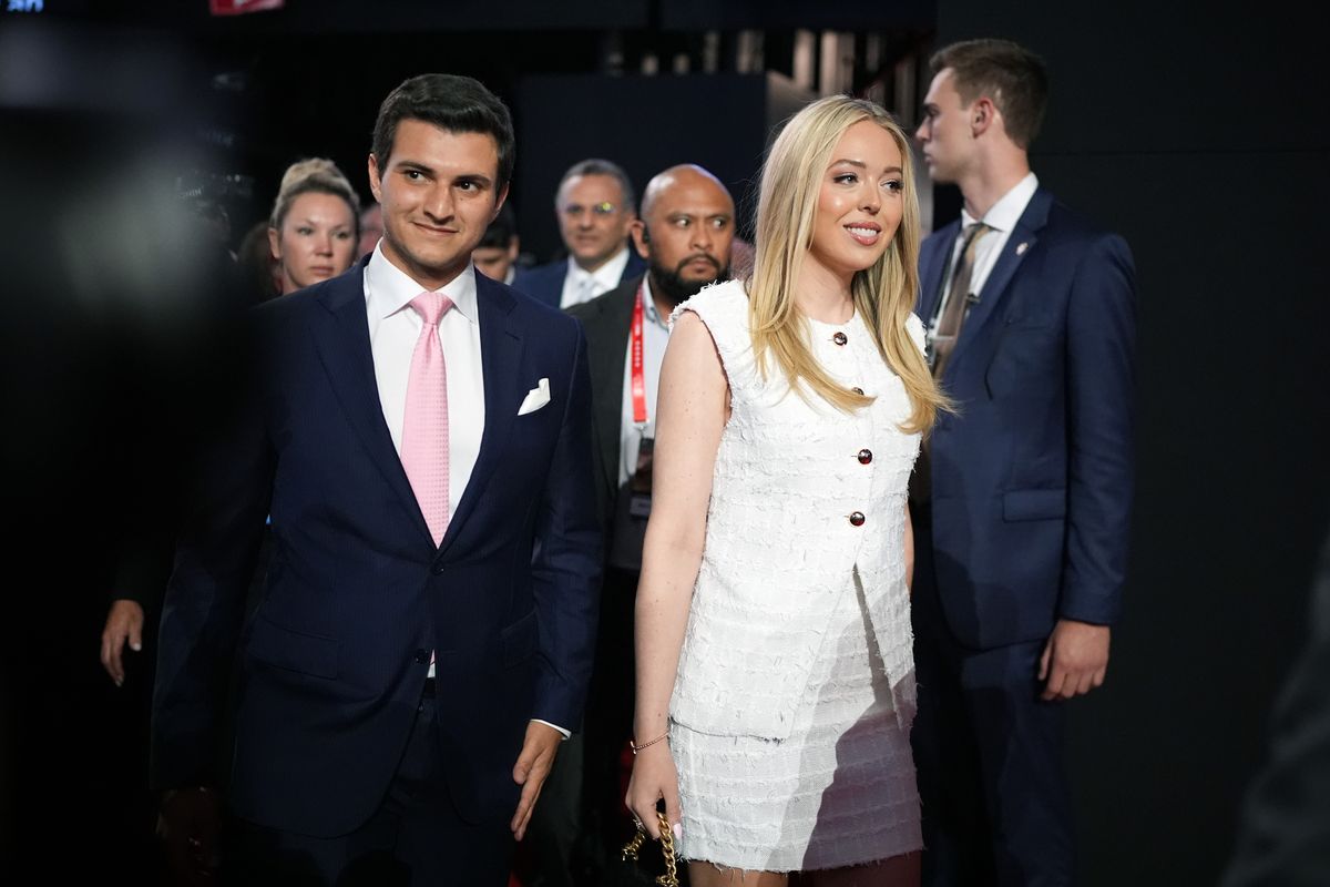 Tiffany Trump, daughter of President Donald Trump, walks with her husband Michael Boulos.