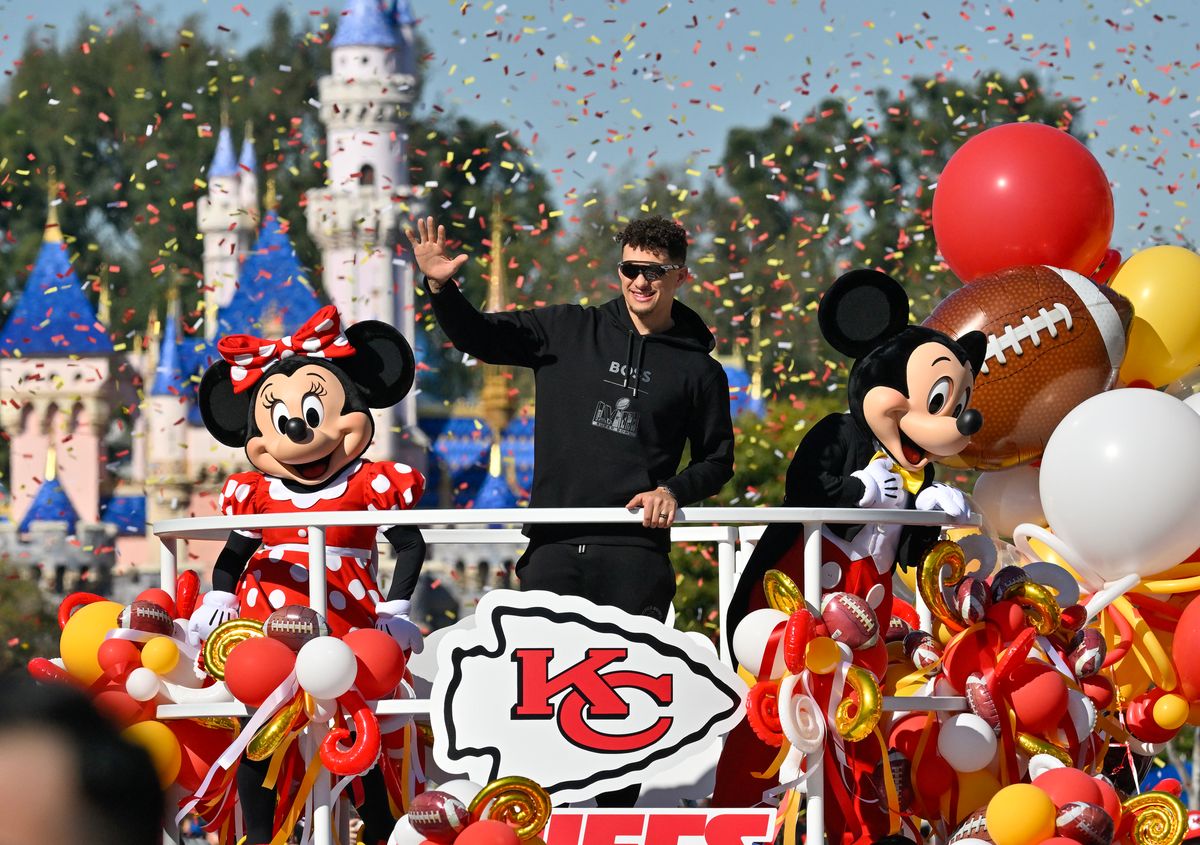 Anaheim, CA - February 12: Super Bowl LVIII MVP, Kansas City Chiefs quarterback Patrick Mahomes, greets fans on Main Street., U.S.A, during a cavalcade through Disneyland in Anaheim, CA, on Monday, February 12, 2024. The Chiefs beat the San Francisco 49ers, 25 to 22, on Sunday in Las Vegas. (Photo by Jeff Gritchen/MediaNews Group/Orange County Register via Getty Images)