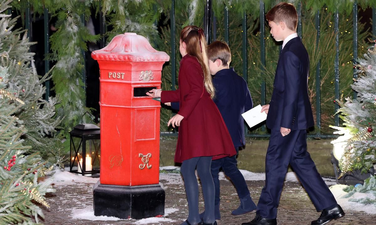 George, Charlotte and Louis arrived with cards to drop off in a special postbox for children who might be struggling this year.