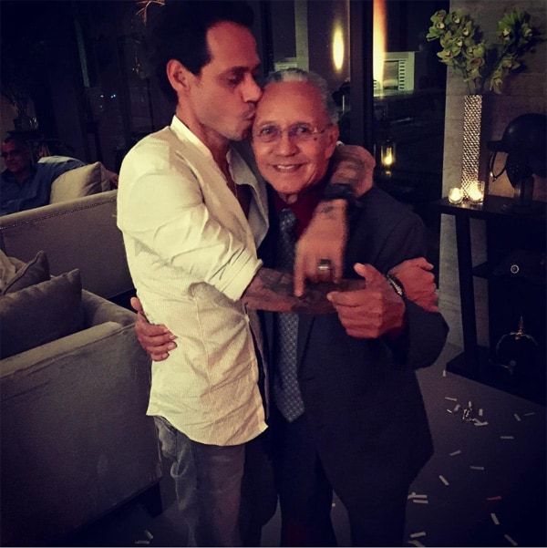 Marc Anthony kisses dad Felipe Muniz